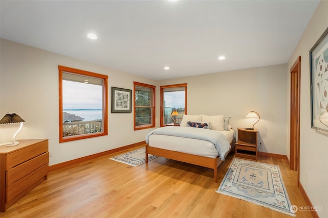 bedroom with light hardwood / wood-style flooring