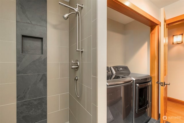 laundry room with washing machine and dryer