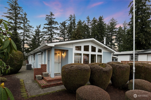 view of front of property with central AC unit