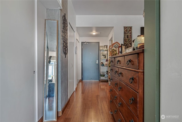 hallway with light wood-type flooring