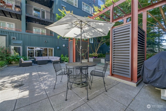 view of patio featuring grilling area and outdoor lounge area