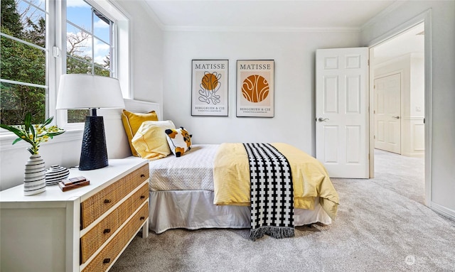 carpeted bedroom with crown molding