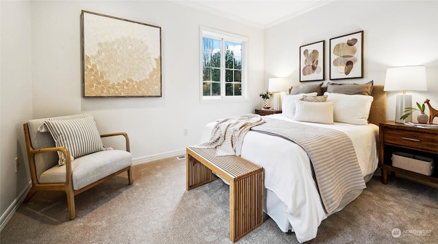 carpeted bedroom featuring crown molding