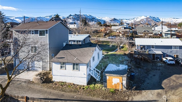 drone / aerial view featuring a mountain view