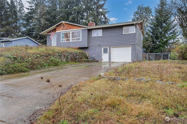 view of front of property featuring a garage