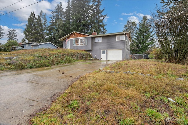 view of front of home featuring a garage