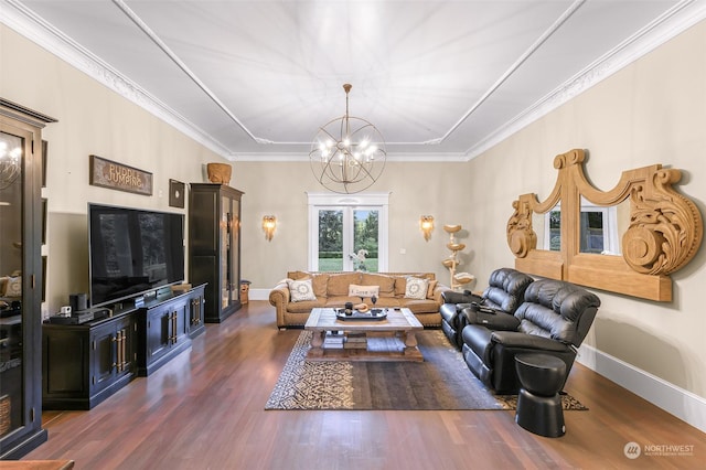 living room featuring french doors, dark hardwood / wood-style flooring, an inviting chandelier, and ornamental molding