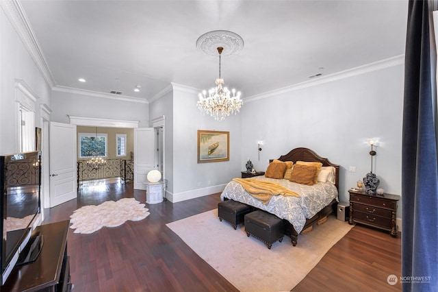 bedroom featuring a notable chandelier, ornamental molding, and dark hardwood / wood-style flooring