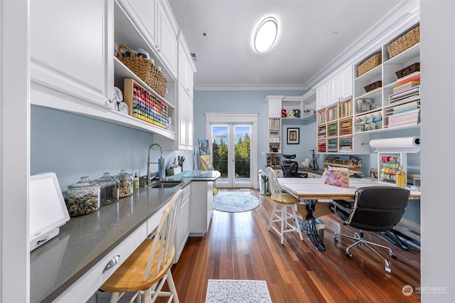 office featuring sink, dark hardwood / wood-style flooring, french doors, and crown molding