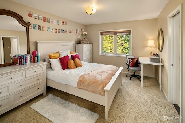 bedroom with light carpet