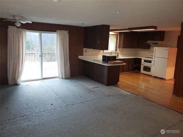 kitchen with ceiling fan, white appliances, light hardwood / wood-style flooring, and dark brown cabinets