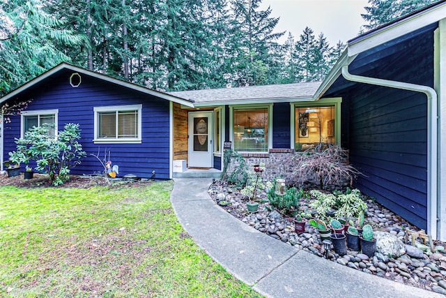 ranch-style house with a front yard