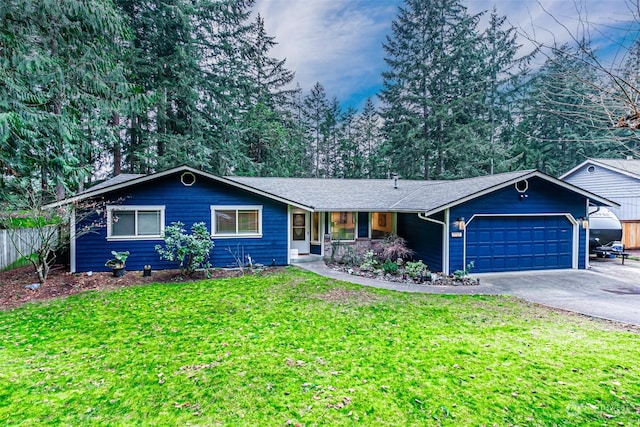 ranch-style home with a front lawn and a garage