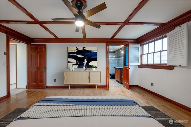 bedroom with coffered ceiling, connected bathroom, ceiling fan, and light hardwood / wood-style flooring