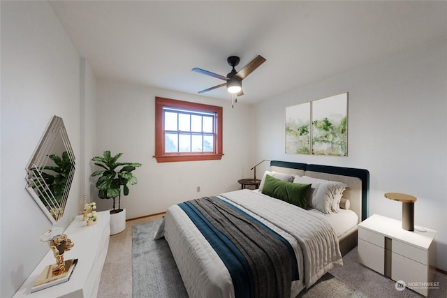 bedroom featuring light carpet and ceiling fan