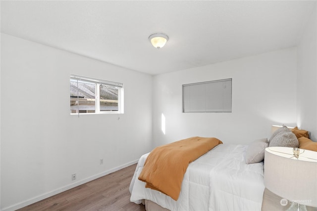 bedroom featuring light hardwood / wood-style floors