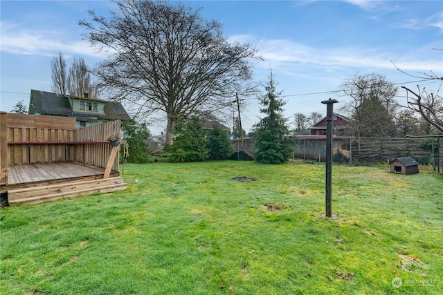 view of yard with a deck