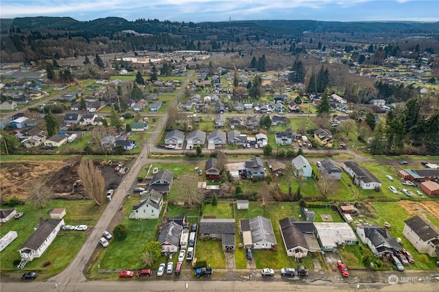 drone / aerial view featuring a mountain view