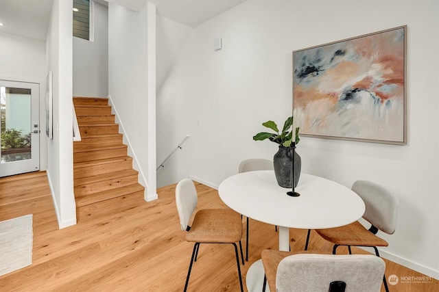 dining space featuring light hardwood / wood-style floors