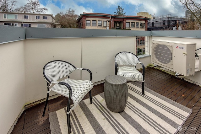 balcony featuring ac unit