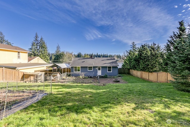 back of property featuring a patio and a lawn