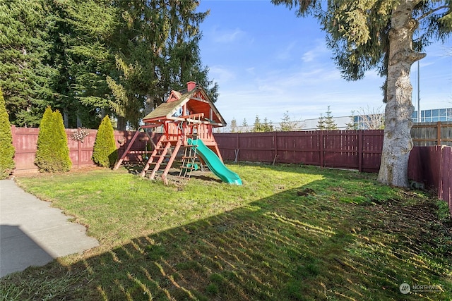 view of playground featuring a lawn