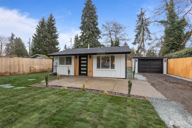 view of outbuilding featuring a lawn