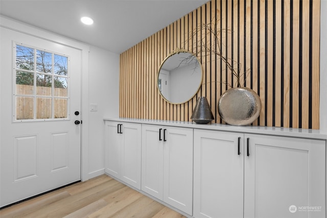 doorway to outside featuring light hardwood / wood-style flooring