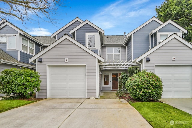 view of front of property featuring a garage