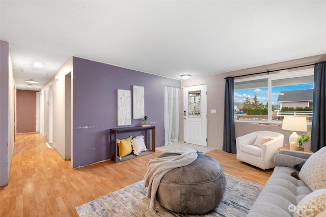 living room with light hardwood / wood-style flooring