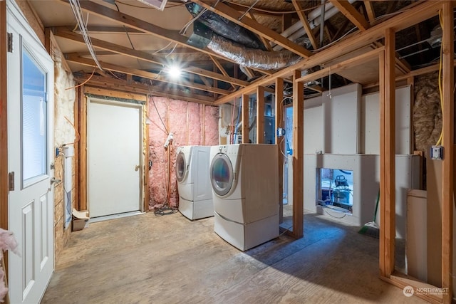 washroom with independent washer and dryer