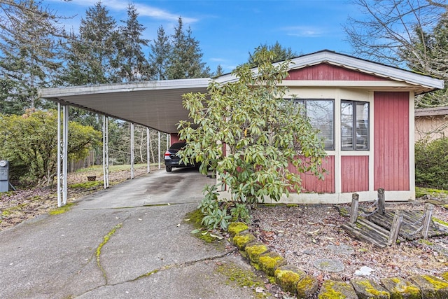 view of parking / parking lot with a carport