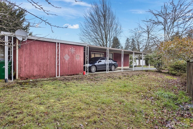 exterior space featuring a yard and a carport