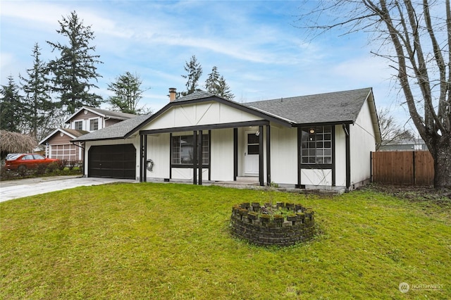 view of front of property featuring a porch, a front yard, and a garage