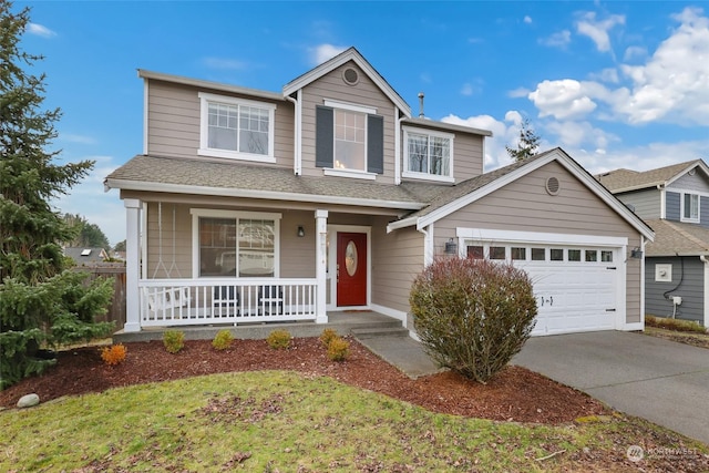 view of front of home featuring a garage and a porch