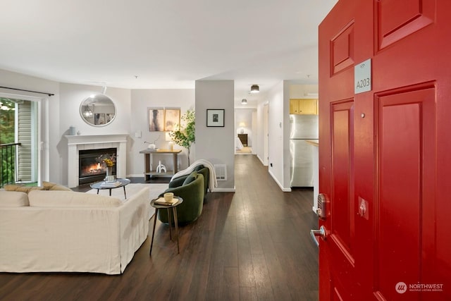 living room featuring dark hardwood / wood-style floors