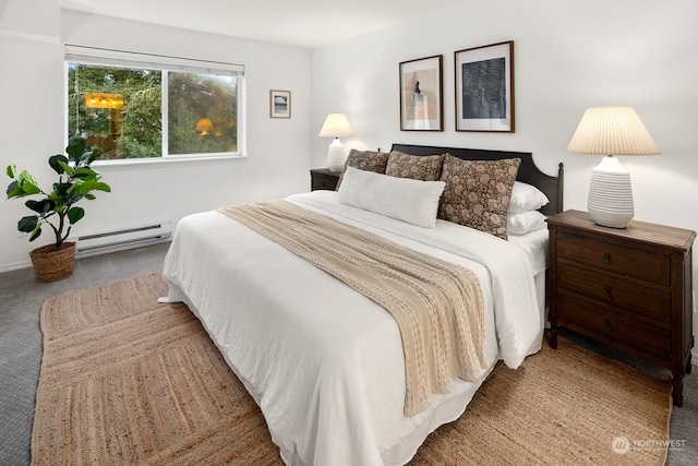 bedroom featuring carpet and a baseboard heating unit