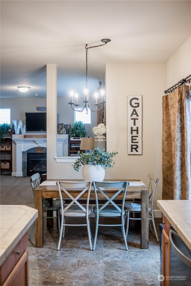 dining space featuring a chandelier