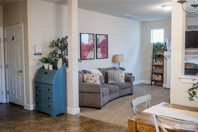 living room featuring a fireplace