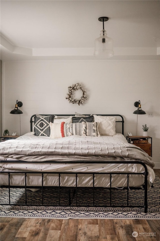 bedroom featuring hardwood / wood-style floors