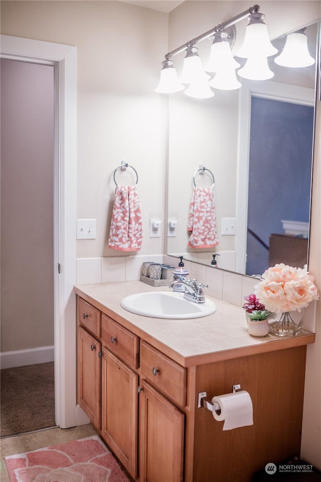 bathroom with tile patterned flooring and vanity