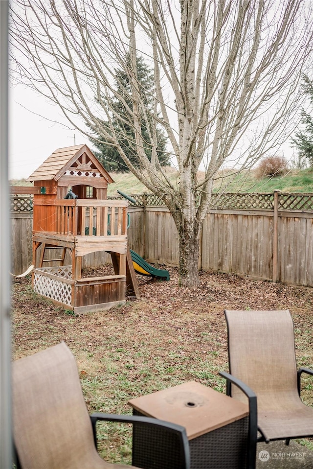 view of yard with a playground