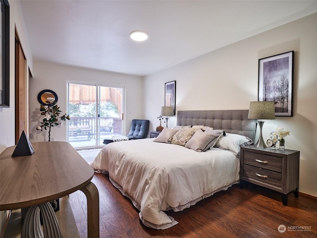 bedroom with access to outside and dark wood-type flooring