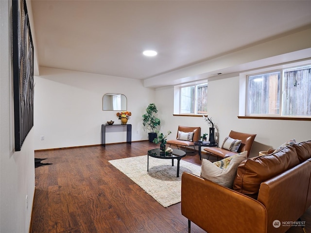 living room with dark wood-style floors and baseboards