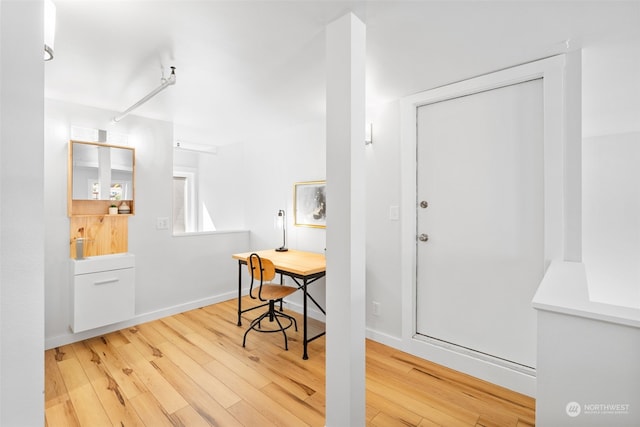 interior space with hardwood / wood-style flooring