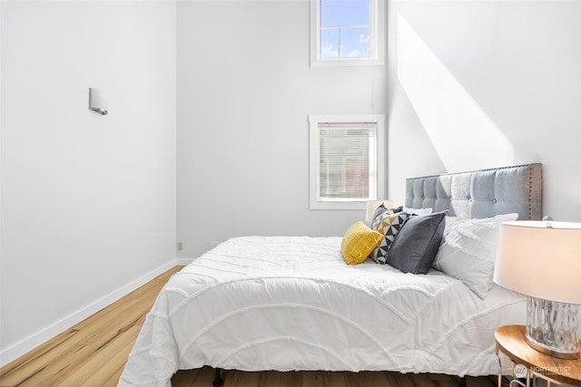 bedroom featuring wood-type flooring