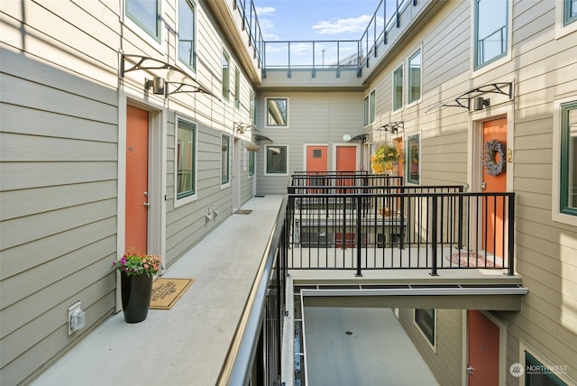 view of patio featuring a balcony