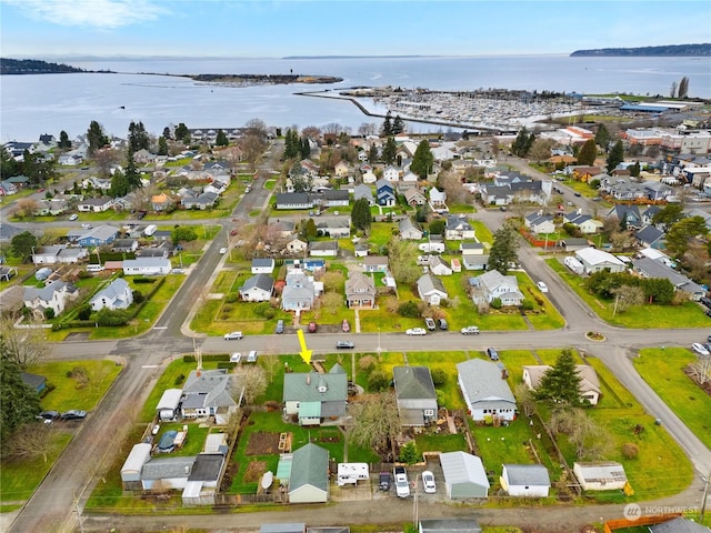 drone / aerial view with a water view