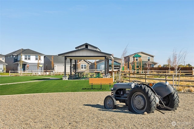 view of playground featuring a lawn