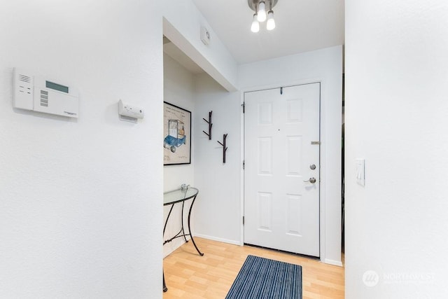 foyer with light hardwood / wood-style flooring